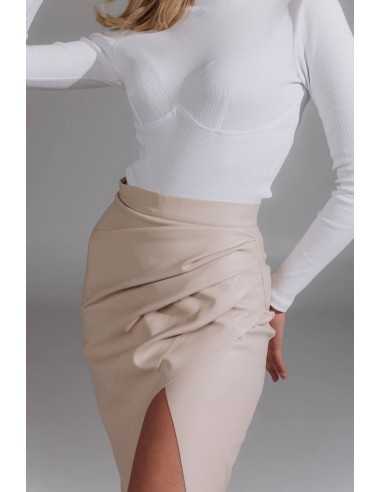 Спідниця з еко шкіри у кольрі слонова кістка